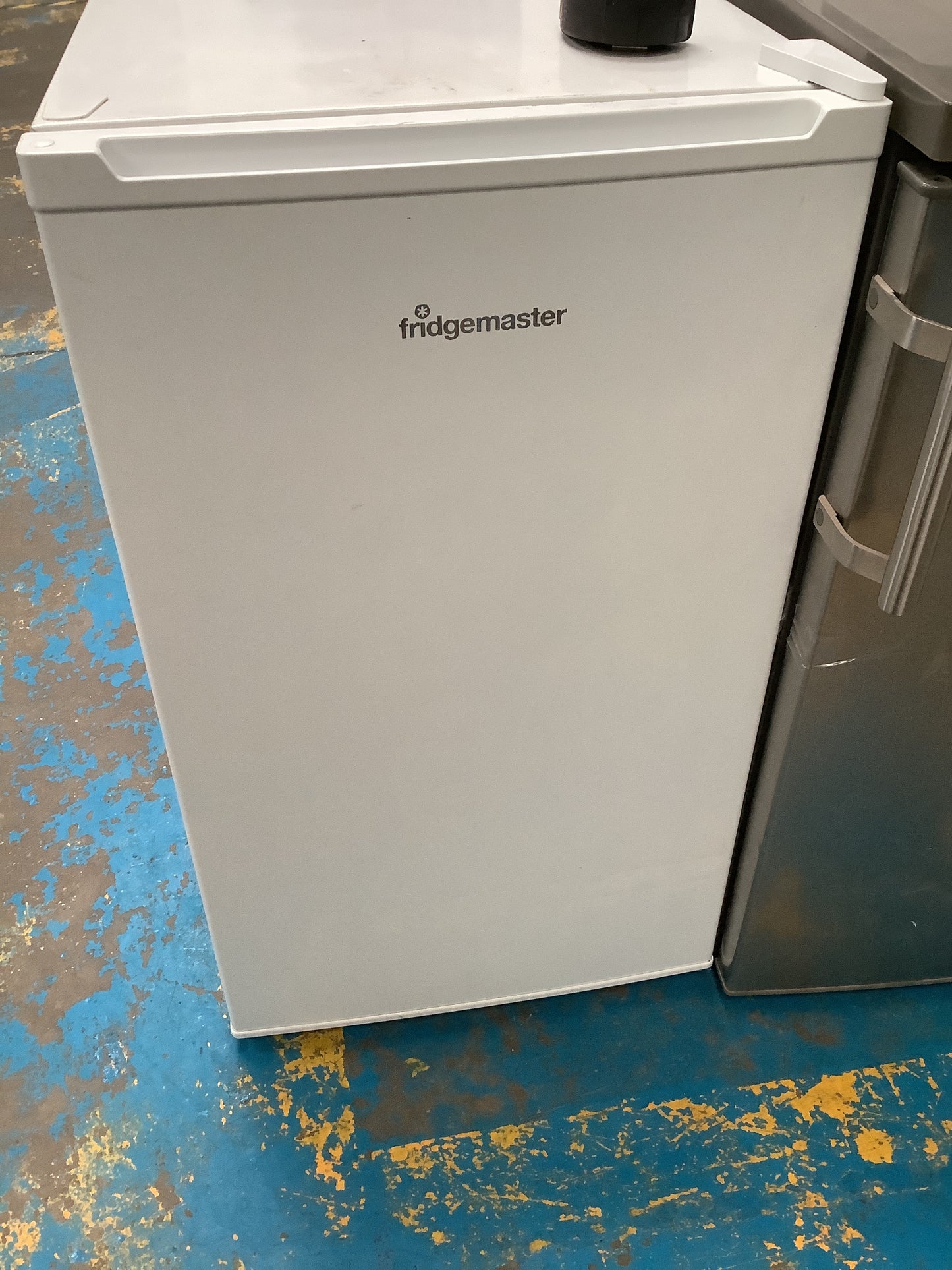 Undercounter fridge.