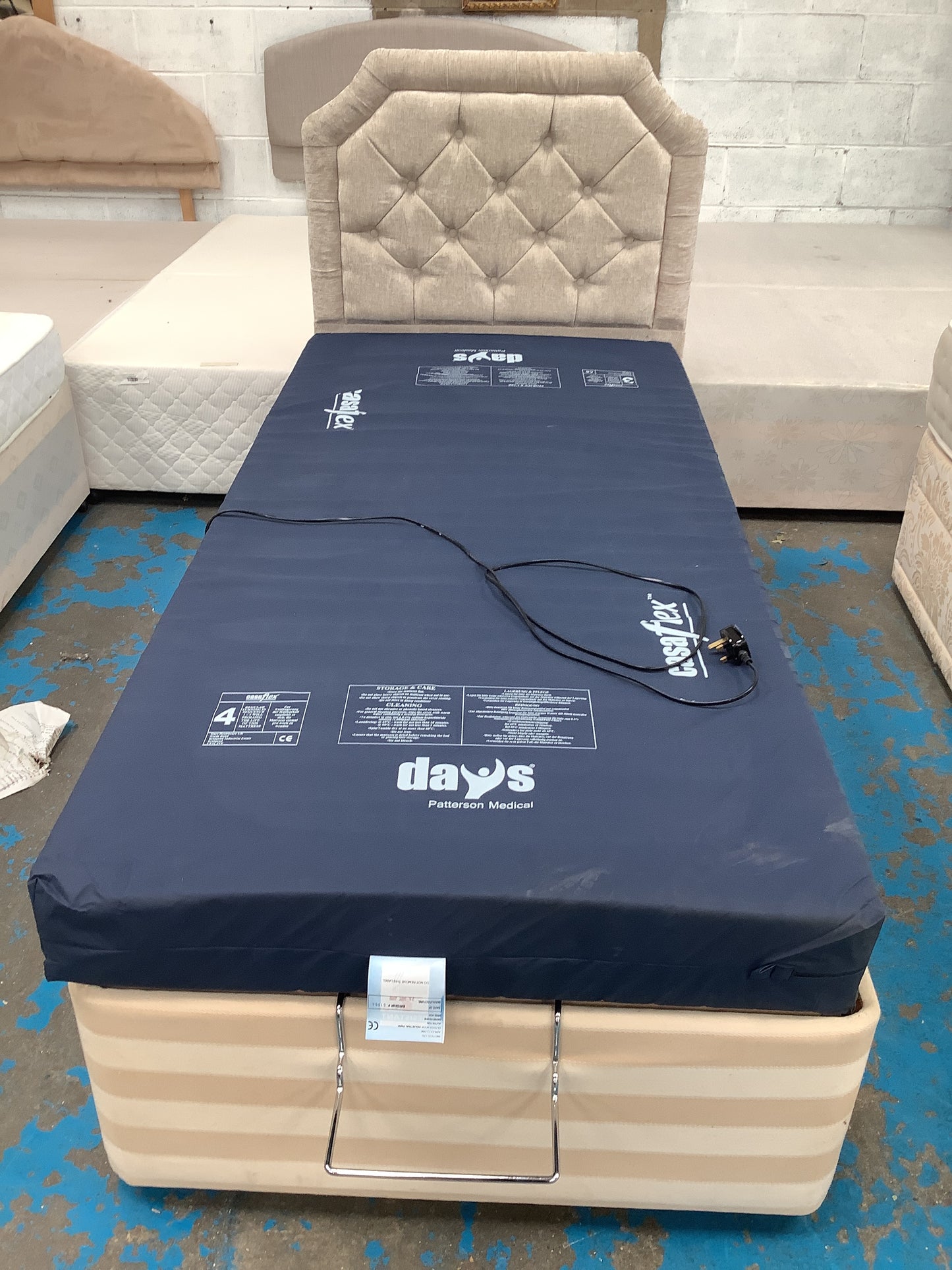 Electric bed with waterproof mattress