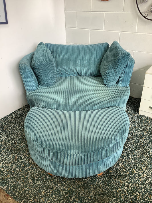 DFS Swivel snuggle chair with footstool