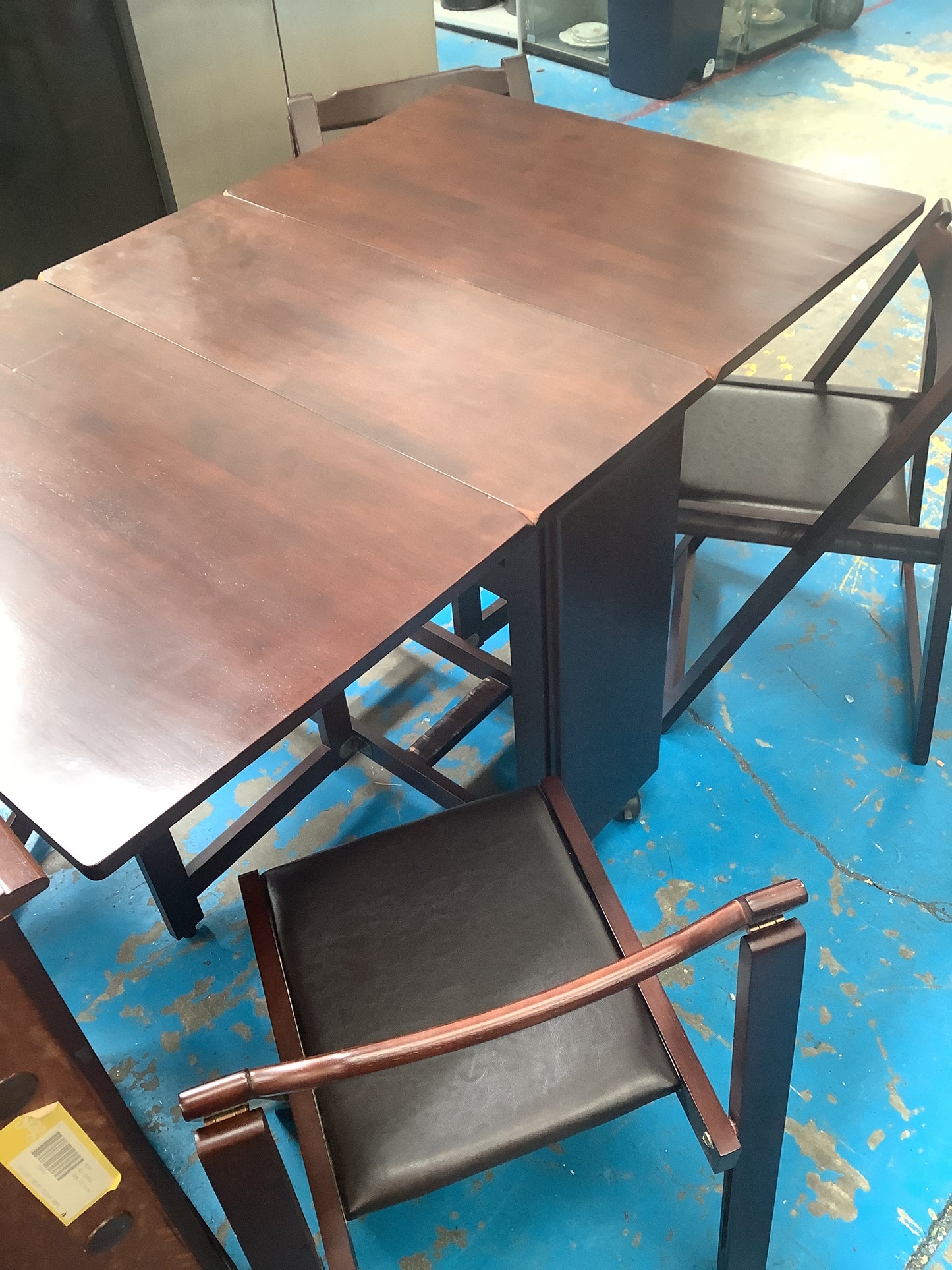 Folding dining table and 4 chairs.
