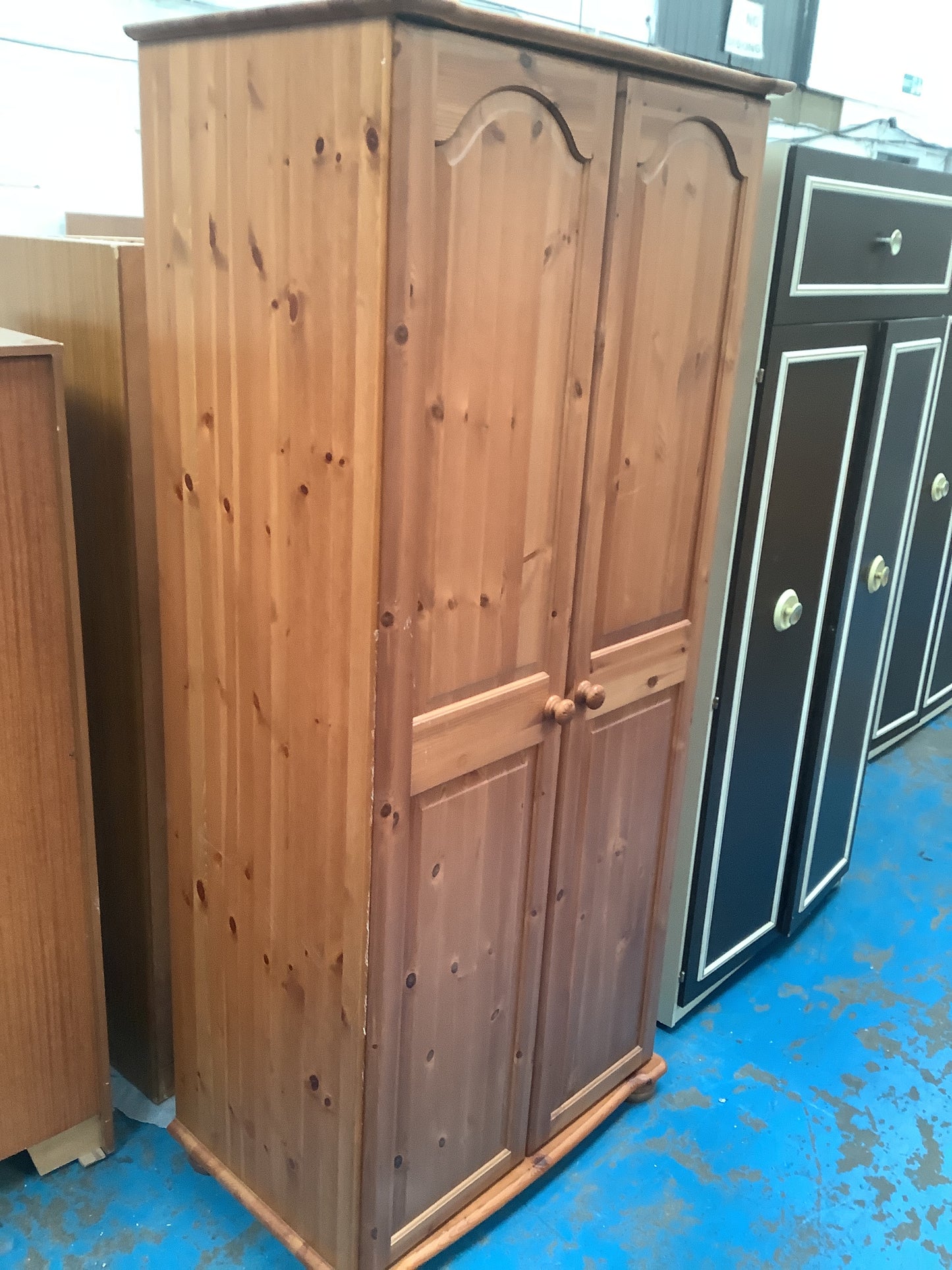 Tall pine wardrobe